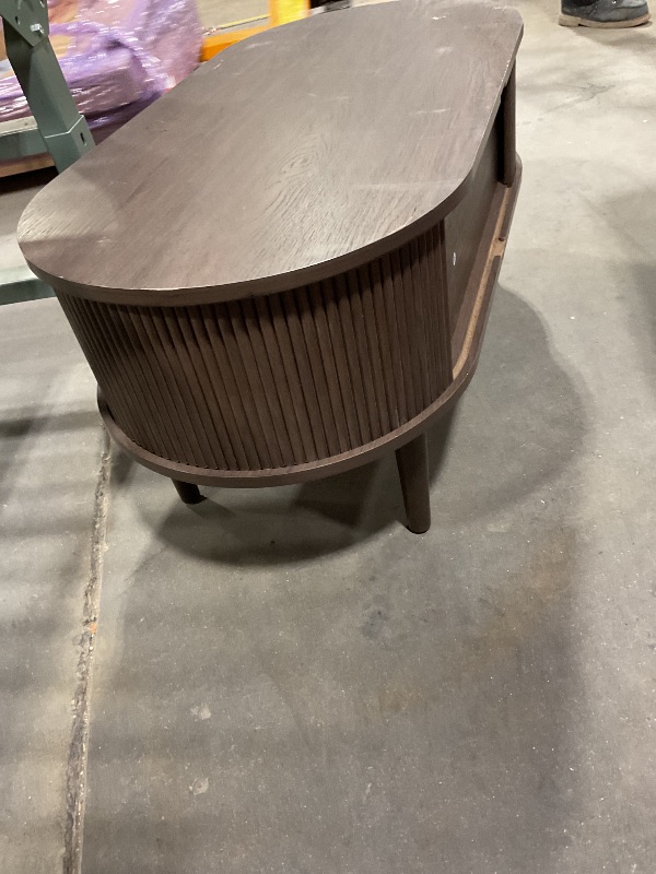 Photo 1 of **DOORS ARE STUCK.MDIRT.MSCRAPES**LINSY HOME Oval Coffee Table, Wood Coffee Table with Storage, Fluted Accent Center Table with Sliding Tambour Door, 39" Mid Century Modern Coffee Tables for Living Room, Bedroom, Apartment, Walnut