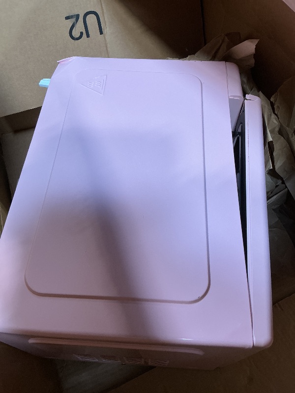 Photo 1 of **DAMAGE SHOWN IN PHOTO**Nostalgia Retro 1000W Microwave Oven 1.1 Cu Ft Capacity – Child Safety Lock, 8 Auto-Cook Settings – Countertop Kitchen Appliance – Pink