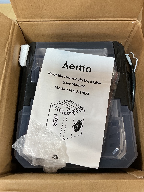 Photo 1 of ***POSSIBLY FOR PARTS / WORKS BUT DOESN'T MAKE ICE VERY WELL*** Aeitto Ice Makers Countertop, 9 Ice Cubes Release in 6 Mins, 26Lbs/24H, 2 Sizes of Bullet Ice Machine,Self-Cleaning Portable Ice Maker with Ice Scoop and Basket for Home Kitchen Office RV Bar