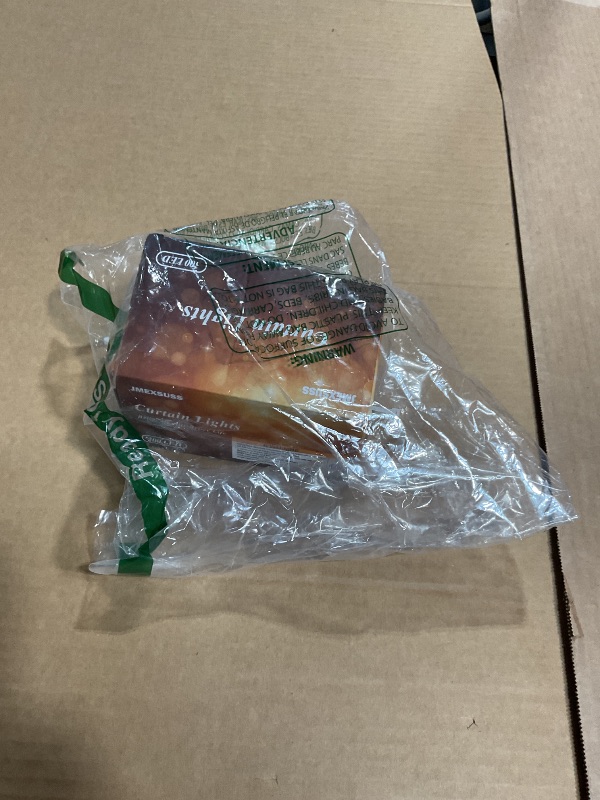 Photo 1 of JMEXSUSS 300 LED Remote Control Curtain Lights, Plug in Fairy Curtain Lights Outdoor, Window Wall Hanging String Lights for Bedroom Indoor Dorm Backdrop Wedding Party Patio Christmas Decor, Warm White