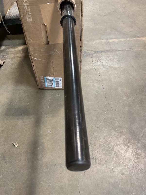 Photo 1 of **SCRAPE DAMAGE ON END**6ft black barbell