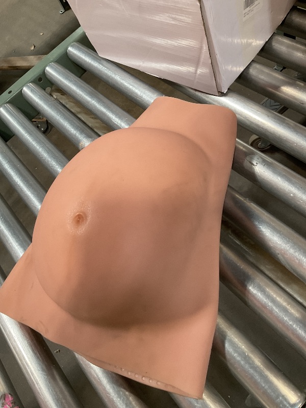 Photo 1 of **DIRT**Silicone fake pregnant belly