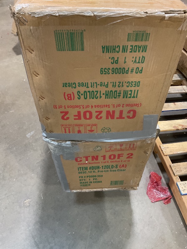 Photo 1 of **2 BOXES**National Tree Company 12 ft Pre-Lit Dunhill Fir Artificial Christmas Tree, 1,500 Clear Lights, 7,794 Tips, Includes Stand, Green