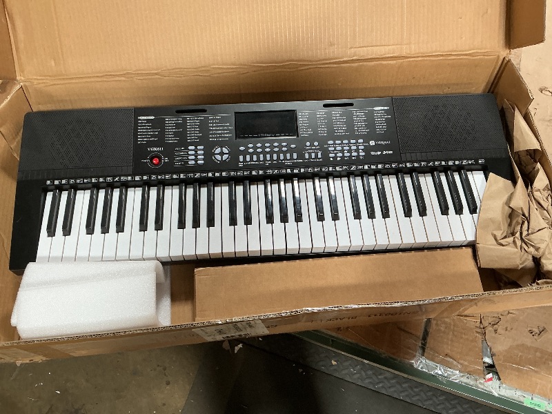 Photo 1 of **MISSING PARTS** Vangoa 61-Key Light-Up Keyboard Piano for Beginners, 350 Tones & Timbres, 3 Teaching Modes, With Microphone, Black