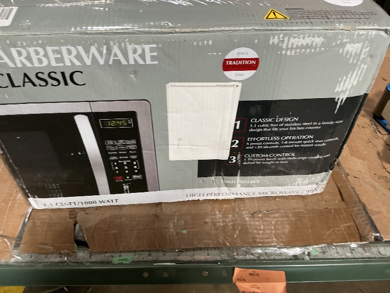 Photo 1 of **NON FUNCTIONAL**Farberware 1.1 Cu. Ft. Countertop Microwave Oven – 1000 Watts Power, Auto Cook Settings, Defrost, Easy Clean and Child Safety Lock - Stainless