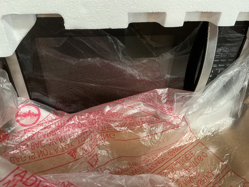 Photo 1 of **NON FUNCTIONAL**Farberware 1.1 Cu. Ft. Countertop Microwave Oven – 1000 Watts Power, Auto Cook Settings, Defrost, Easy Clean and Child Safety Lock - Stainless