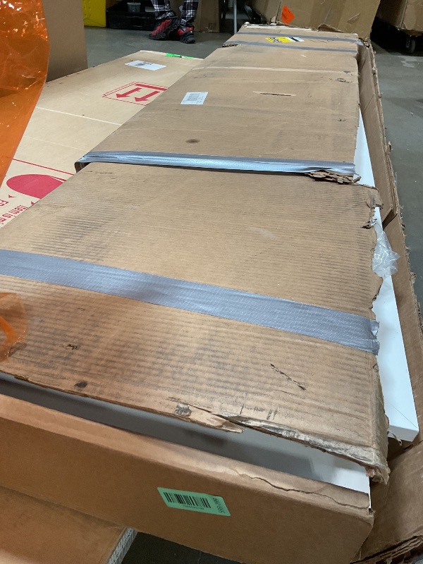 Photo 1 of **CHIP DAMAGE. **White cabinet