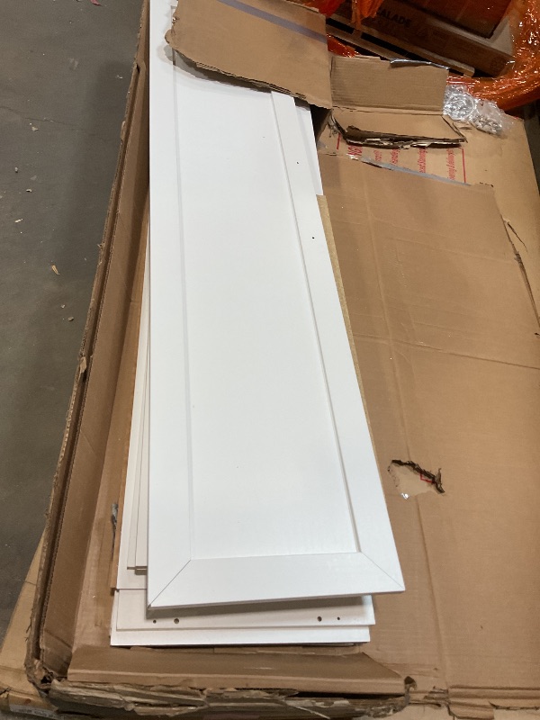 Photo 1 of **CHIP DAMAGE. **White cabinet