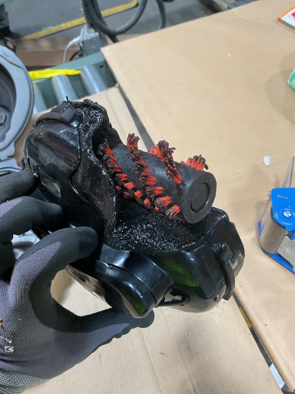 Photo 1 of **BURN DAMGE. MISSING CHARGER. SELLING FOR PARTS**Grillbot Automatic Grill Cleaning Robot with Nylon Brushes, BBQ Grill Cleaner, Grill Brush, Grill Scraper, BBQ Accessories (Black Grillbot + Carry Case)