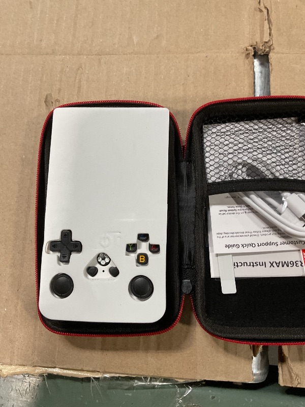 Photo 1 of ?R36MAX 4000mAh Portable Rechargeable Handheld Retro Game Console,Comfort Non-Slip Handheld Standing Retro Game Console with 64G TF Car,4.0-inch Screen,for Office,White