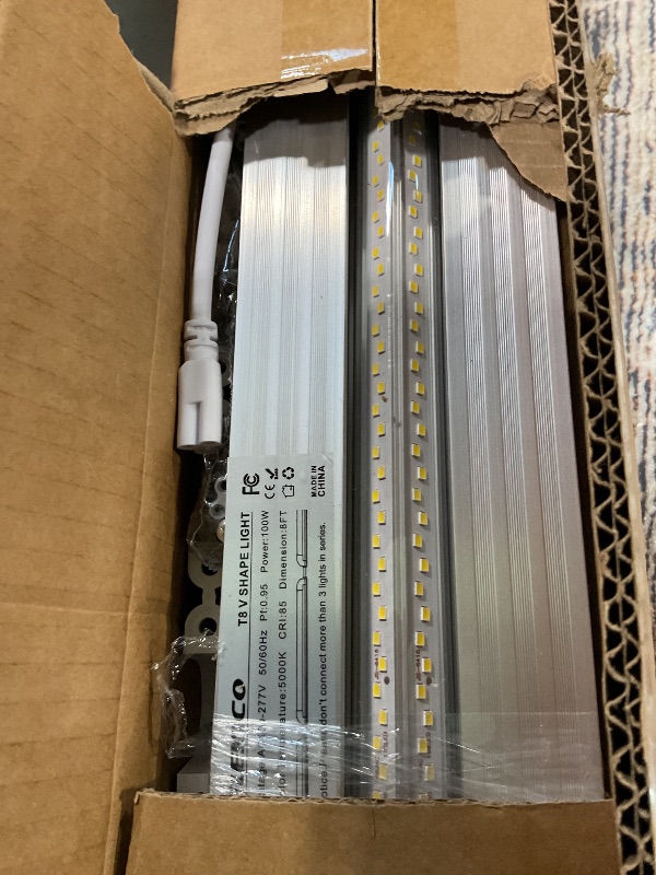 Photo 1 of **MISSING ASSEMBLY HARDWARE/ 2 LIGHTS ARE NON-FUNCTIONAL*** ELEKICO 6 Pack 100w 8ft Led Shop Light, Super Bright 15000lm 5000k V Shape 8' Led Shop Lights, Linkable 8 Foot Led Shop Lights for Garage Warehouse, Supermarket, Basement, Barn, Storage Area