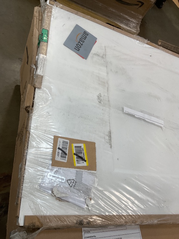 Photo 1 of **DIRT/DENT**BarnSmith 36"x84" Concealed Sliding Barn Door, 2 Panel White Primed Solid Core Hidden Barn Door with Soft Close Installation Hardware and Double Sided Pulls Included, Pre-Assembled Panel