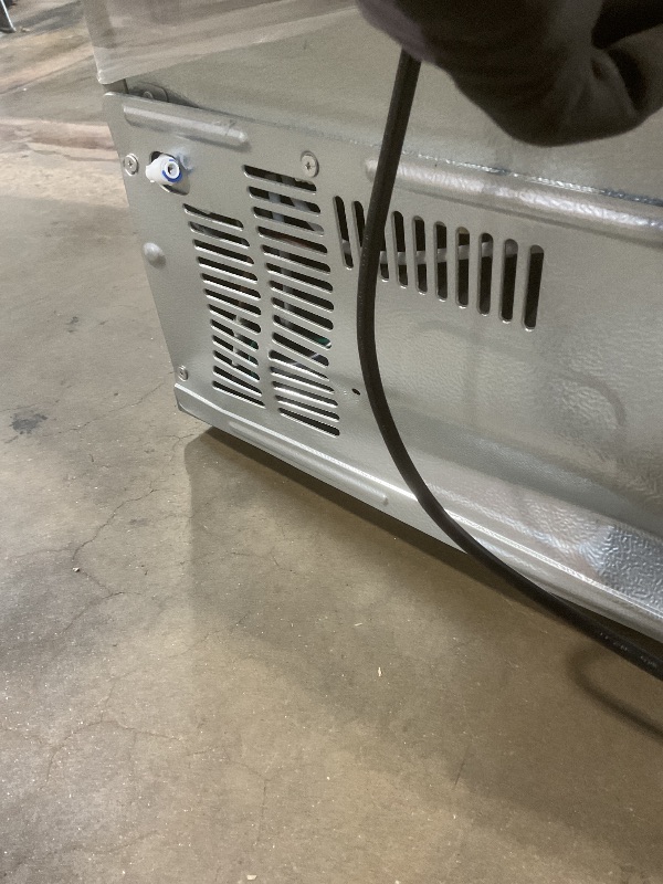 Photo 1 of **BROKEN FAN AND PAN ON BACKSIDE/DIRT/ DENT/ SCRAPES FROM TRANSPORT/ FOR PARTS ONLY **COWSAR 20 Cu.ft French Door Refrigerator with Nugget & Cube Ice Maker, External Water Dispenser,Stainless Steel, Smart Digital Controls –Fingerprint-Resistant for Kitche