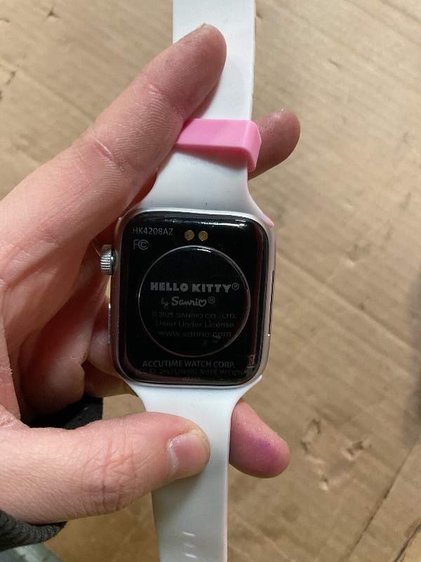 Photo 1 of **MISSING CHARGER/WATCH SCREEN IS LOOSE *** Hello Kitty Smart Watch for Girls by Accutime with Interactive Touchscreen, Bluetooth, Camera, Music, Fitness & Activity Tracking - Durable & Stylish (Model: HK4208)