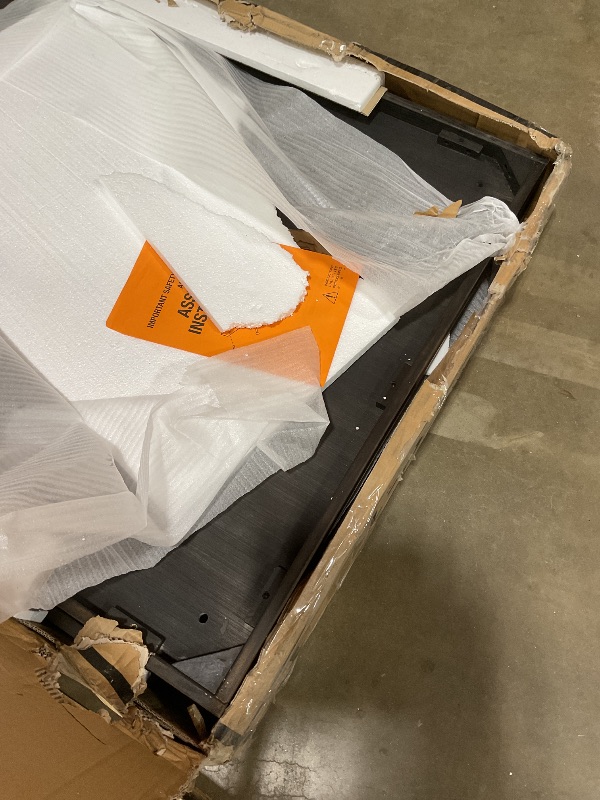 Photo 1 of **2 HOLES DAMAGE**Signature Design by Ashley Johnelle Farmhouse Coffee Table with Weathered Gray Finish, Gray