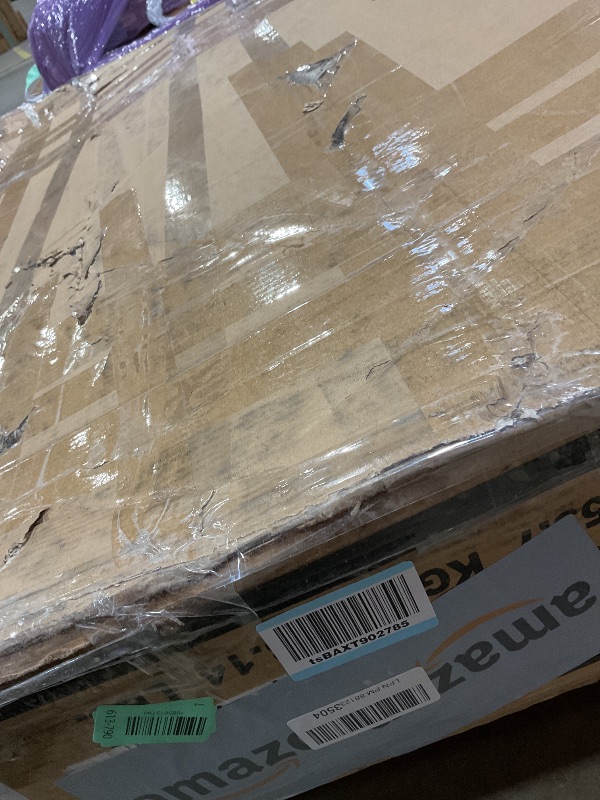 Photo 1 of **2 HOLES DAMAGE**Signature Design by Ashley Johnelle Farmhouse Coffee Table with Weathered Gray Finish, Gray