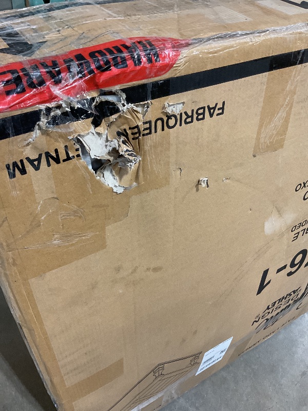 Photo 1 of **2 HOLES DAMAGE**Signature Design by Ashley Johnelle Farmhouse Coffee Table with Weathered Gray Finish, Gray