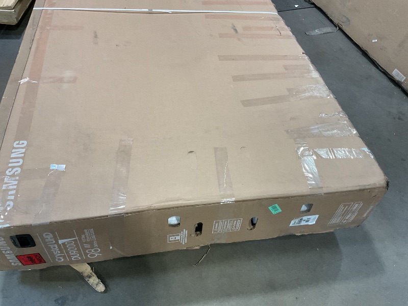 Photo 1 of **MAJOR DAMAGE. SELLING FOR PARTS****Samsung 98-Inch Class 4K Crystal UHD DU9000 Series HDR Smart TV, Object Tracking Sound Lite, Motion Xcelerator 120Hz, Supersize Picture Enhancer, Mega Contrast, Alexa Built-In (UN98DU9000, 2024 Model)