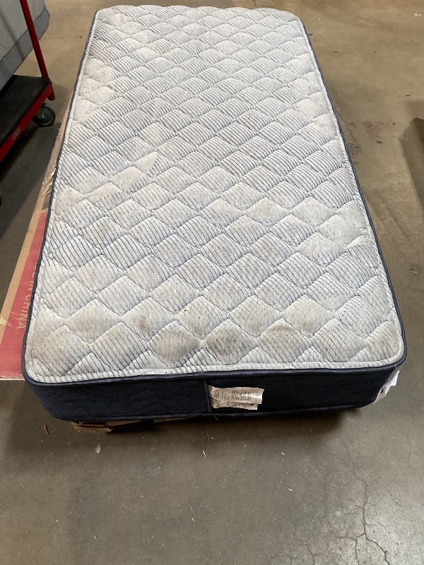 Photo 1 of *** STOCK PHOTO ONLY/MAJOR DAMAGE – DIRTY FROM TRANSPORT*** TWIN SIZE 12 INCH SERTA MATTRESS