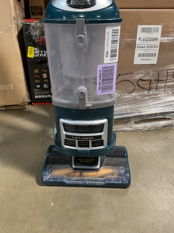 Photo 1 of *** USED/MAJOR DAMAGE***Shark Upright Vacuum, Navigator Lift-Away with Self-Cleaning Brushroll, HEPA Filter, Swivel Steering, Upholstery Tool & Pet Crevice Tool, Perfect for Pets & Multi-Surface, Teal, ZU503AMZ