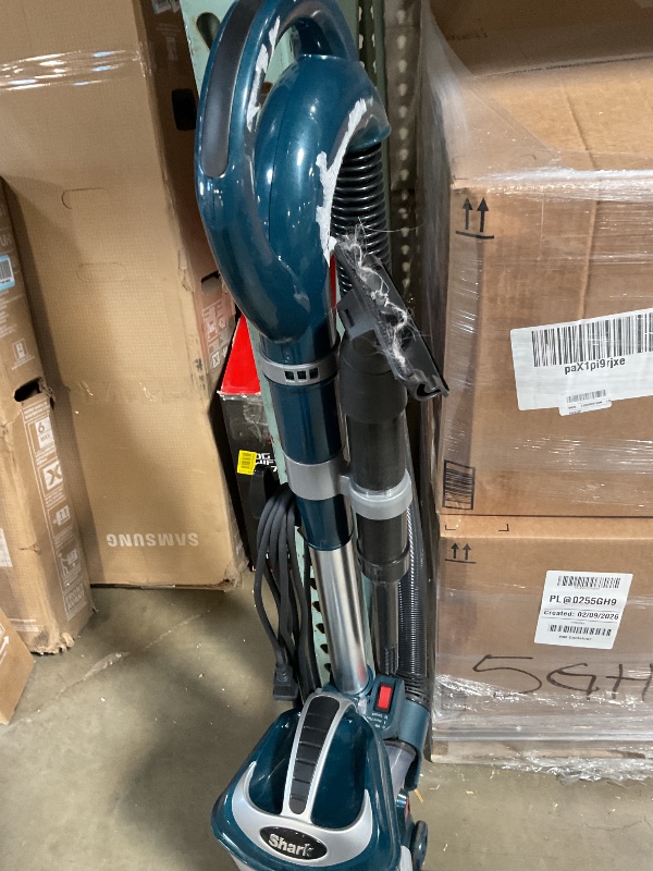 Photo 1 of *** USED/MAJOR DAMAGE***Shark Upright Vacuum, Navigator Lift-Away with Self-Cleaning Brushroll, HEPA Filter, Swivel Steering, Upholstery Tool & Pet Crevice Tool, Perfect for Pets & Multi-Surface, Teal, ZU503AMZ