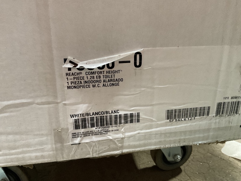 Photo 1 of *** MAJOR DAMAGE/SEE PHOTOS ***KOHLER 78080-0 Reach Comfort Height Chair Height One-Piece Compact Elongated Toilet with Skirted Trapway, Left-Hand Trip Lever, 1.28 GPF