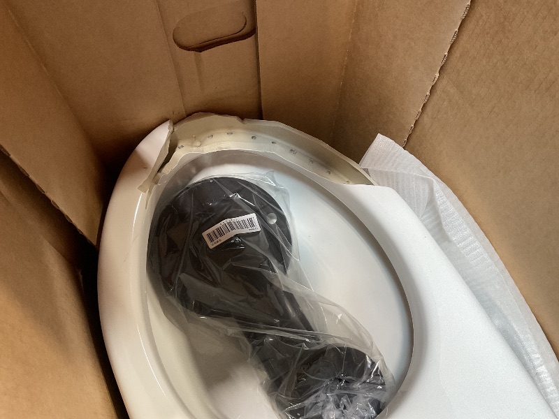 Photo 1 of *** MAJOR DAMAGE/SEE PHOTOS ***KOHLER 78080-0 Reach Comfort Height Chair Height One-Piece Compact Elongated Toilet with Skirted Trapway, Left-Hand Trip Lever, 1.28 GPF