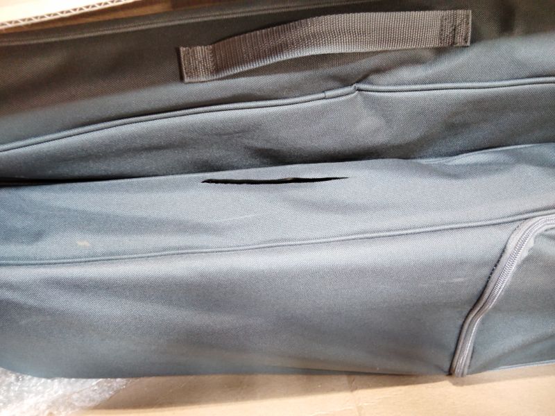 Photo 1 of ***RECOMENDED FOR PARTS / DAMAGED (CUT BY BOX CUTTER)*** EVER ADVANCED Folding Camping Cot for Adults, Compact Sleeping Cots with Side Pocket, Portable Heavy Duty Foldable Camp Bed with Carry Bag for Outdoor, Travel, Grey