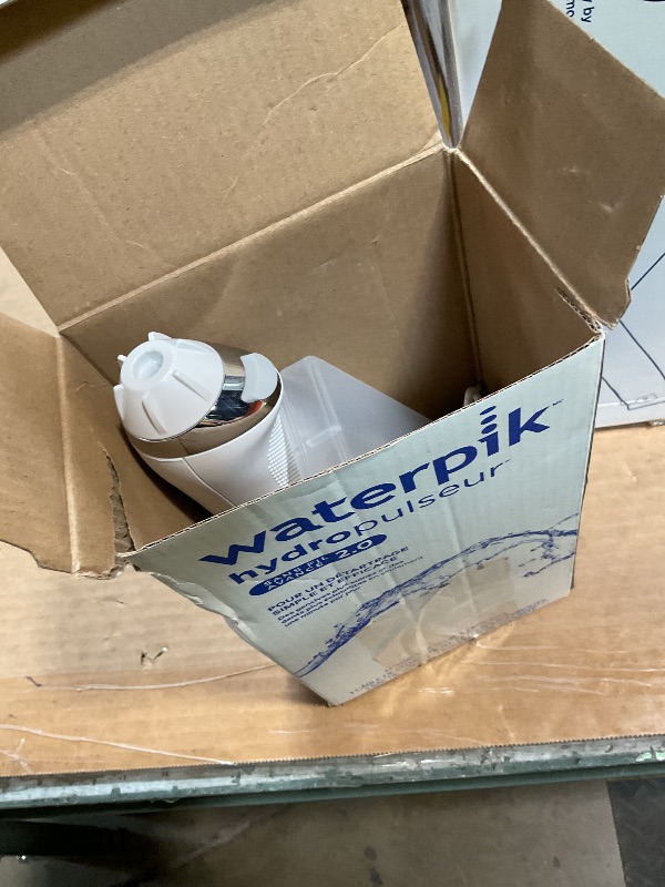 Photo 1 of ***DOESN'T CHARGE/ FOR PARTS ONLY** Waterpik Cordless Advanced 2.0 Water Flosser For Teeth, Gums, Braces, Dental Care With Travel Bag and 4 Tips, ADA Accepted, Rechargeable, Portable, and Waterproof, White WP-580, Packaging May Vary