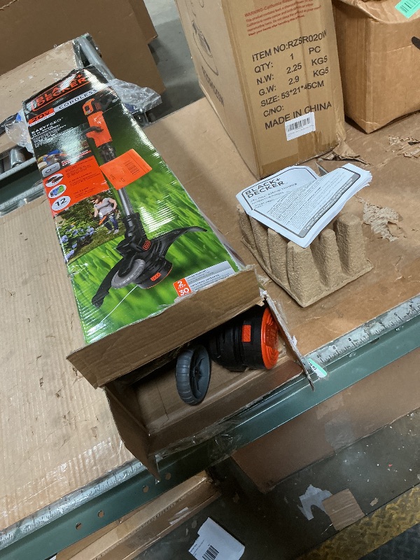 Photo 1 of ***POSSIBLY FOR PARTS/BATTERIES WON'T HOLD CHARGE*** BLACK+DECKER 20V MAX Cordless String Trimmer and Edger, 12 Inch Weed Eater, 2-Speed Control Weed Wacker, 2 Batteries, Charger and Spool Included (LSTE525)