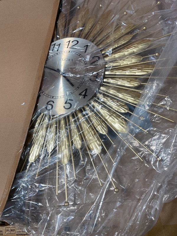Photo 1 of ***NON FUNCTIONAL*** HEBOIX 27" Gold Mid Century Modern Wall Clock?Battery Operated Decorative Decorative Metal Wall Clock for Living Room/Bedroom/Office/Bathroom Wall Art&Clocks