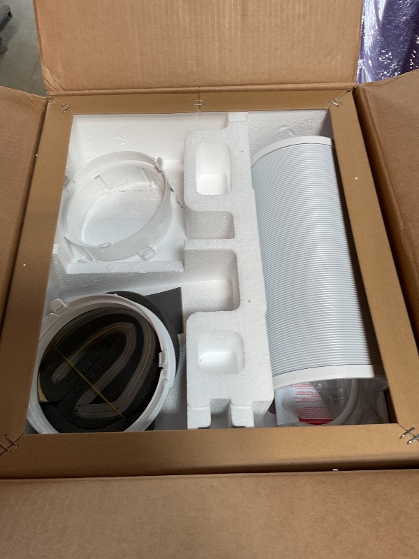Photo 1 of ***FOR PARTS / DAMAGED (BROKEN)*** Amazon Basics 4-In-1 Portable Air Conditioner with Remote, Timer, Sleep Mode, Auto Swing, Cool/Heat/Dry/Fan-Only Functions, 13500 BTU (ASHRAE), Cools Up to 550 Sqf, Energy Saving, White