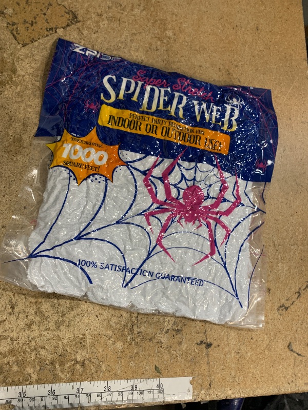 Photo 1 of 1000 sqft Spider Webs Halloween Decorations Bonus with 30 Fake Spiders, Super Stretch Cobwebs for Halloween Indoor and Outdoor Party Supplies