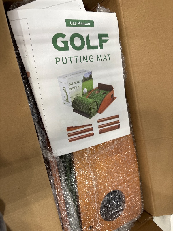 Photo 1 of Putting Green Indoor Outdoor Golf Putting Mat with Automatic Ball Return, 9.84FT Golf Practice Mat with 3 Golf Ball, Putter Ball Golf Game Gifts for Home, Office, or Backyard