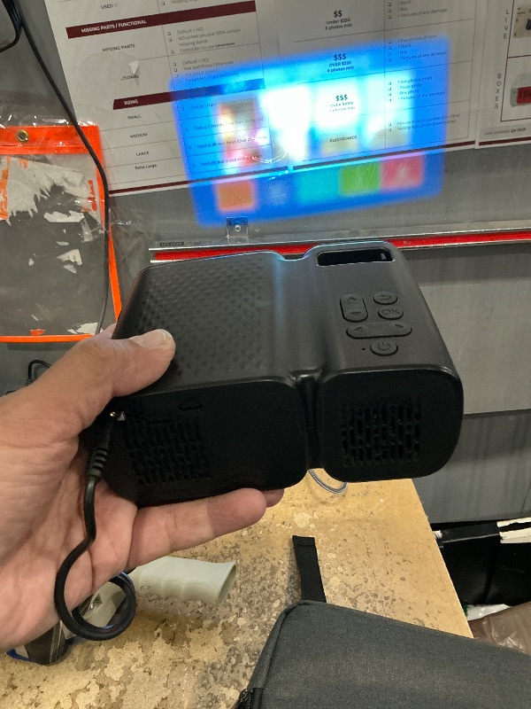 Photo 1 of ***FOR PARTS *** [Electric Focus] Projector with Wifi and Bluetooth, 1200 ANSI Portable Outdoor Projector 4K, Tkisko Native 1080P Video Projector, Movie Projector for Outdoor Use, Compatible with iOS/Android/TV Stick