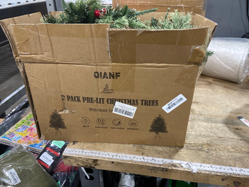Photo 1 of ***STYLE MAY DIFFER*** QIANF 2 Pack Pre-lit Artificial Christmas Trees with Multi-Color Lights, Timer, 30 Inch Battery Operated Lighted Porch Christmas Trees Outdoor Holiday Decorations for Entrance Pathway Front Door Yard