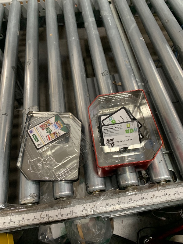 Photo 1 of (item used) Pokémon TCG: Team Rocket Tin