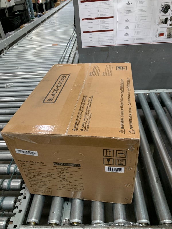 Photo 1 of ****FACTORY SEALED***BLACK+DECKER Digital Microwave Oven with Turntable Push-Button Door, Child Safety Lock, Stainless Steel, 0.9 Cu Ft