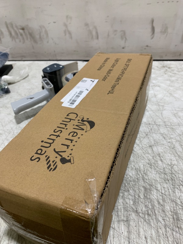 Photo 1 of 2 ft Small Mini Prelit Artificial Christmas Tree with Color LED Lights, Remote Control and Timer, Perfect PE+PVC Little Tabletop Christmas Tree for Table Top Decor, Home,Wedding, Dining Desk, 2 Foot