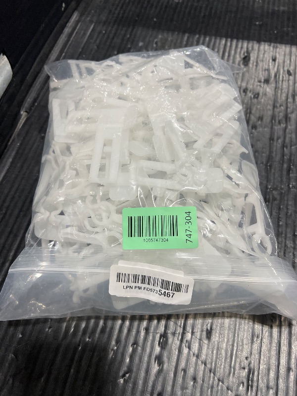 Photo 1 of RISHACA All-in-One Christmas Light Clips - 100 Packs for Gutter, Roof, Shingle - Compatible with C7, C9 & Mini String Lights - Heavy Duty Outdoor Hanging Clips for Holiday Decoration