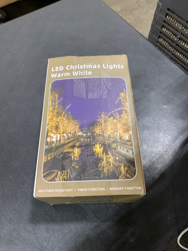 Photo 1 of 1500 LED 470FT Christmas String Lights Outdoor, 12 Modes and Timer Memory Dimmable, Plug in Waterproof Dark Green Wire Twinkle Fairy Light for for Xmas Yard Tree Wedding Party Decor (Warm White)