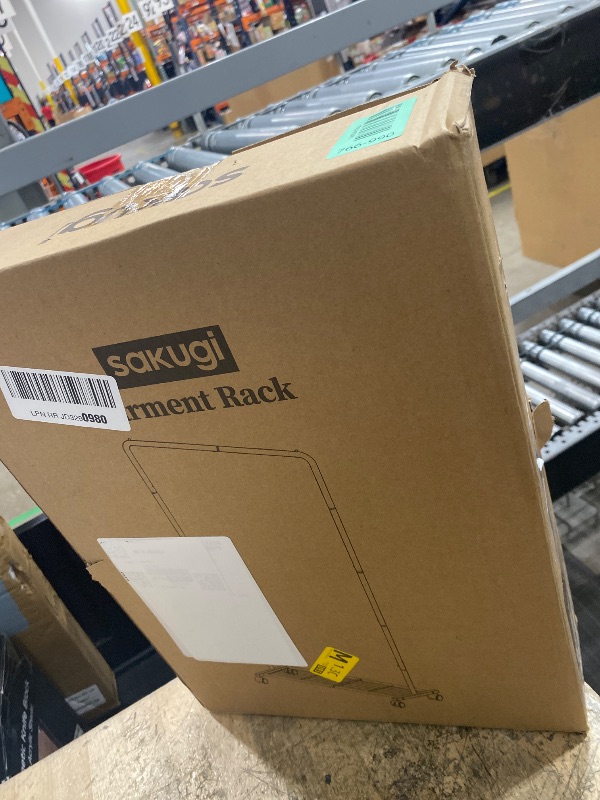 Photo 1 of ***MISSING PARTS***
Sakugi Clothes Rack - Clothing Rack with Storage Mesh Shelf & Casters, Heavy-Duty Metal Clothing Rack for Hanging Clothes, Dresses, Coats, Large Load Capacity, Easy Assembly, Black, 28.0"x16.9"x59.0"
