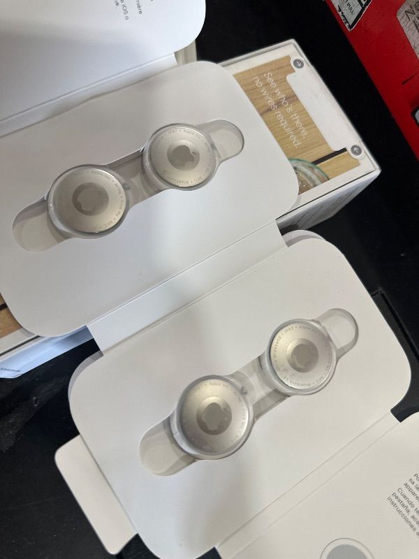 Photo 1 of **FACTORY SEALED** Apple AirTag (1st Generation) - 4 Pack. Keep Track of and find Your Keys, Wallet, Luggage, Backpack, and More. Simple one-tap Set up with iPhone or iPad, Bluetooth