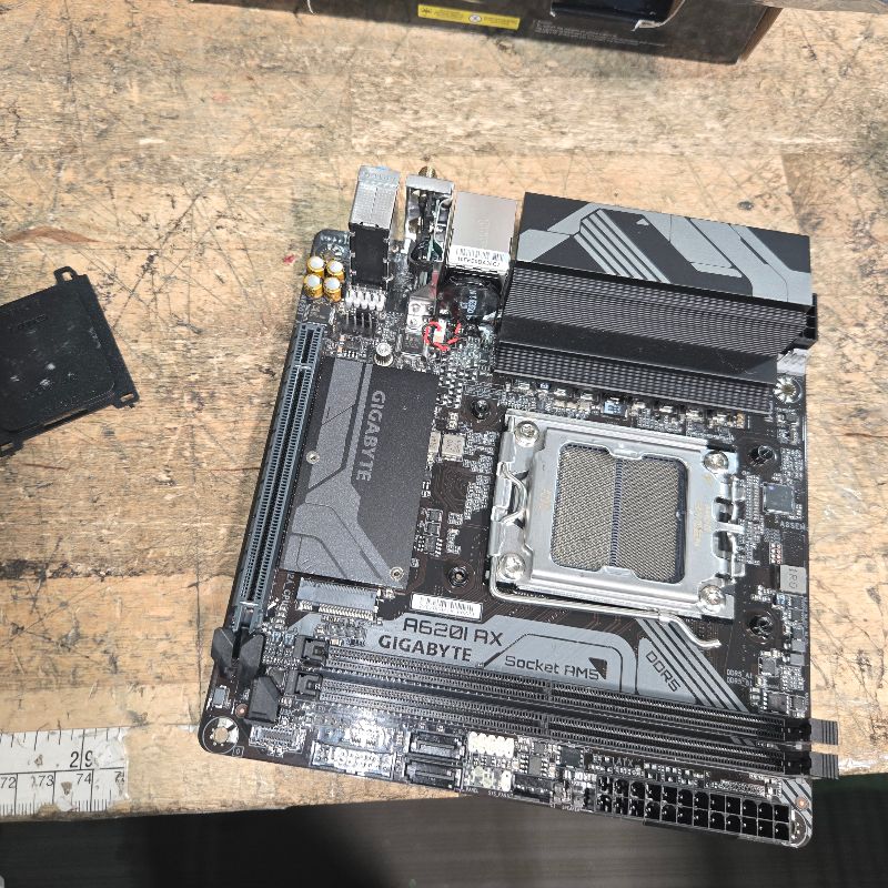Photo 1 of **BENT PINS** GIGABYTE A620I AX (AM5/ LGA 1718/ AMD/ A620/ Mini-ITX/ 5-Year Warranty/ DDR5/ Single M.2/ PCIe 4.0/ USB 3.2 Gen1 Type-C/Realtek Wi-Fi 6E/ Realtek 2.5GbE/ Q-Flash Plus/PCIe EZ-Latch/Motherboard)