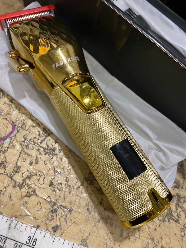 Photo 1 of ***COVERED IN OIL/ GREASE & HAIR*** FADEKING® Professional Hair Clippers & Beard Trimmer Set for Men – Cordless Barber Clippers with LCD Display, Precision Trimmer & Travel Case – Gifts for Men Husband Father (Gold + Bronze)