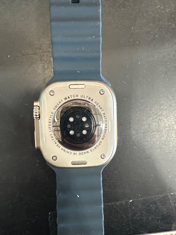 Photo 1 of *** UNAUTHENTIC APPLE PRODUCT *** Apple Watch Ultra [GPS + Cellular 49mm] Titanium Case with Midnight Ocean Band, One Size (Renewed)