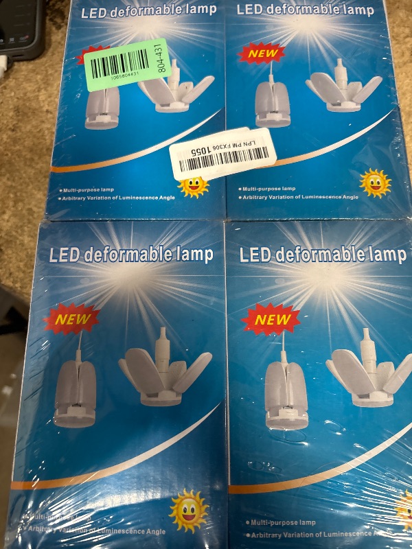 Photo 1 of (4 Pack) LED Garage Lights, 60W Trilights Ceiling, High Low Bay Deformable Adjustable 4 Led Light Bulbs 6000LM 6000K, Screw in Tribright Garage Lighting Fixture,CRI80 Daylight