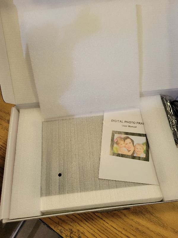 Photo 1 of 10.1 inch Digital Photo Frame with Remote Control, Electronic Picture Frame Large Display, Share Moments via SD Card and Mini USB, Wall Mountable, 1080P HD Resolution, Built-in Clock & Calendar