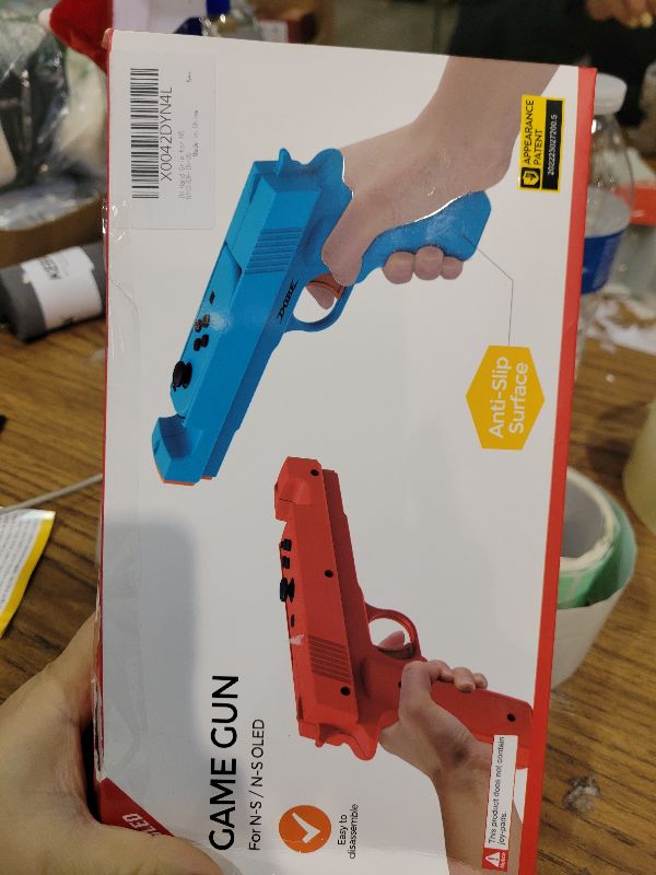 Photo 1 of 2 Pack Shooting Game Gun Controllers for Nintendo Switch/Switch OLED Controller,Gun Hand Grip Motion Controller Gamepad Joypad Gaming Accessories for Nintendo Switch Shooter Hunting Games (Blue + Red)