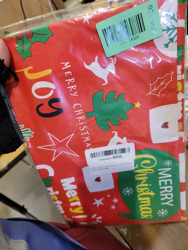 View 2 of 2 Pack Jumbo Christmas Gift Bag with Tag & Tie, 56" X 36" Oversized Christmas Plastic Wrapping Bags, Giant gift Bags for Huge Present Decoration, Holiday Bags for Large Gifts, Toys, Goodie Supplies